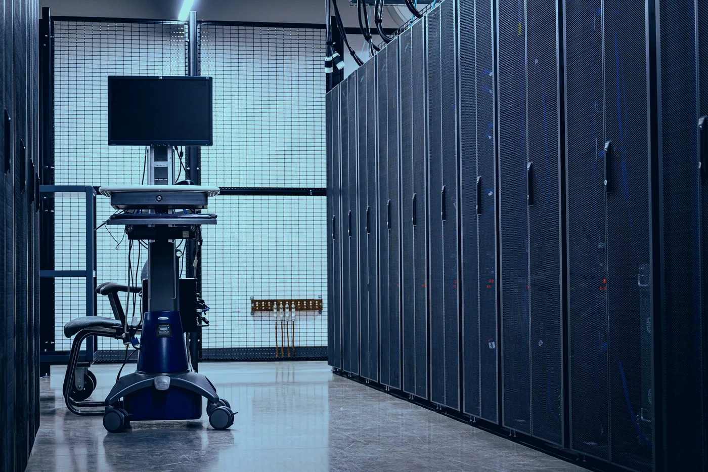 Server cabinets and a monitoring station inside a ComputexITy-managed data centre